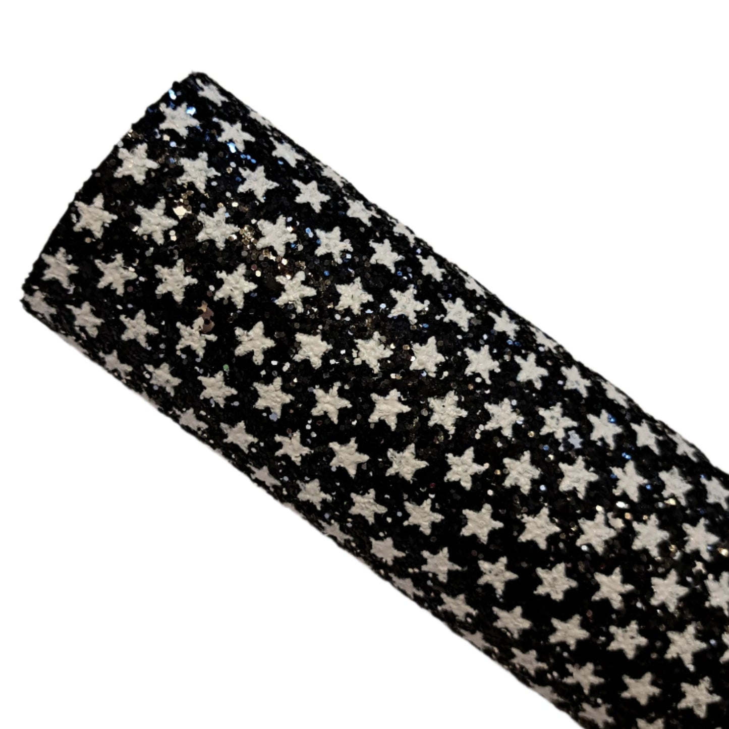 chunky glitter white stars on black coloured roll on a white background