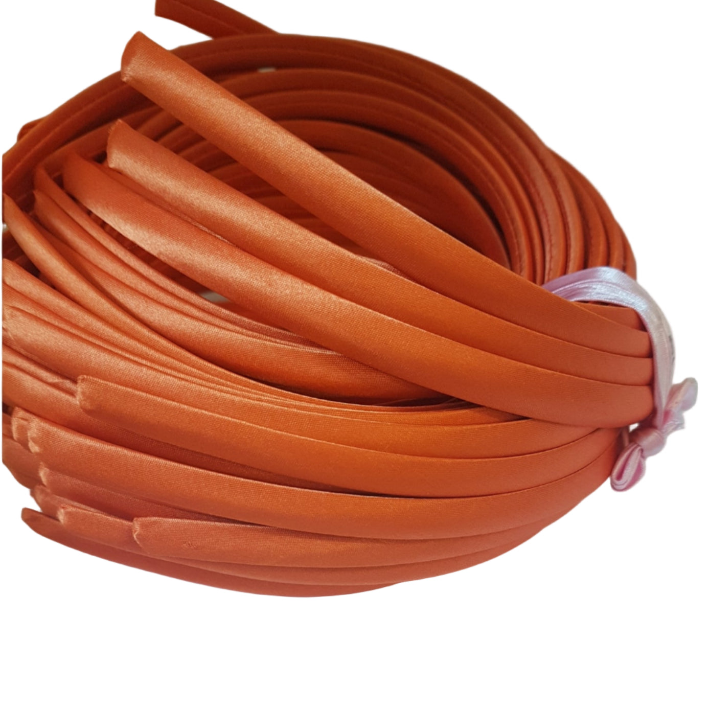 satin headbands in a dandelion colour on a white background