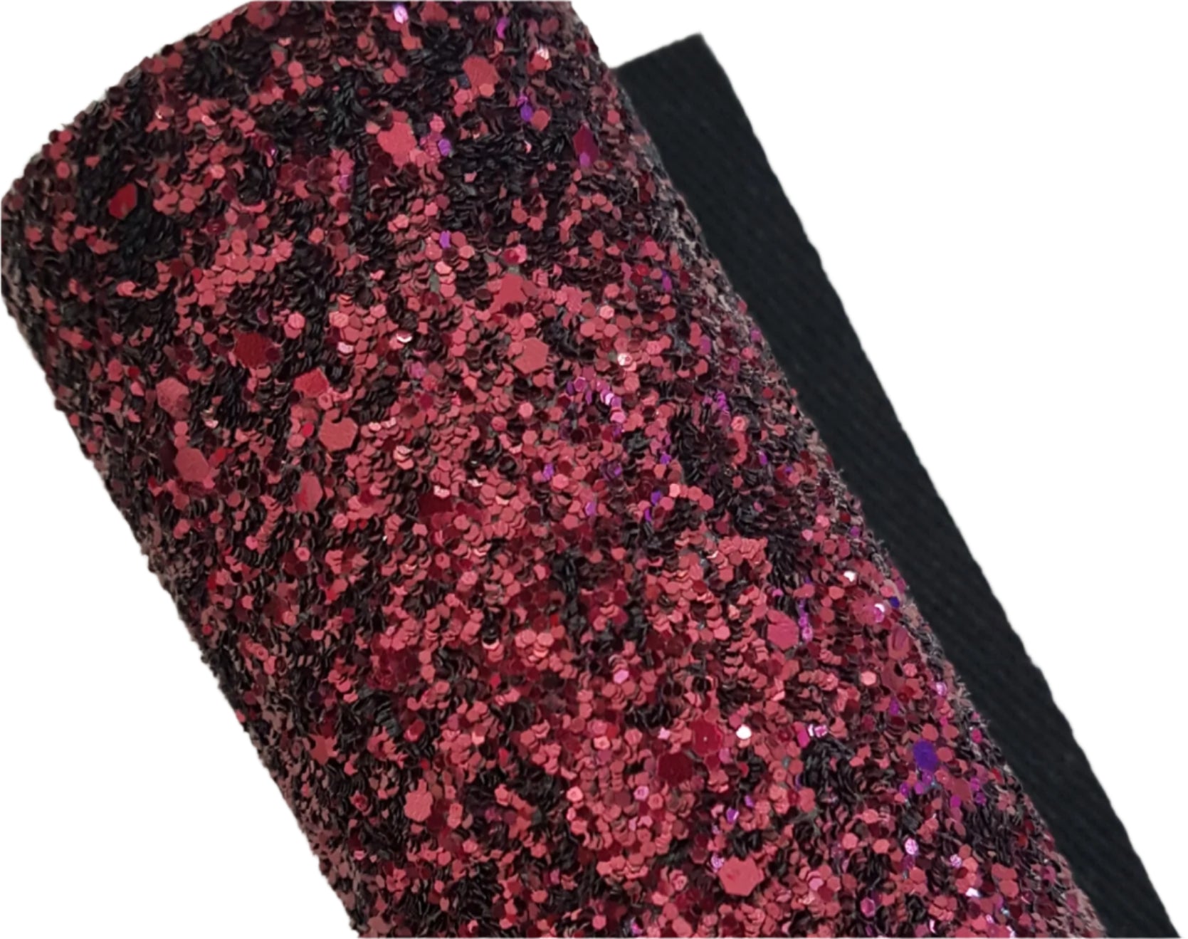 Roll of red glittery fabric on a white background