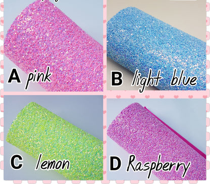 Four glittery fabric samples in pink, light blue, lemon, and raspberry colors with labels.