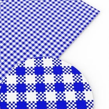 A sample of blue gingham leatherette on a white background