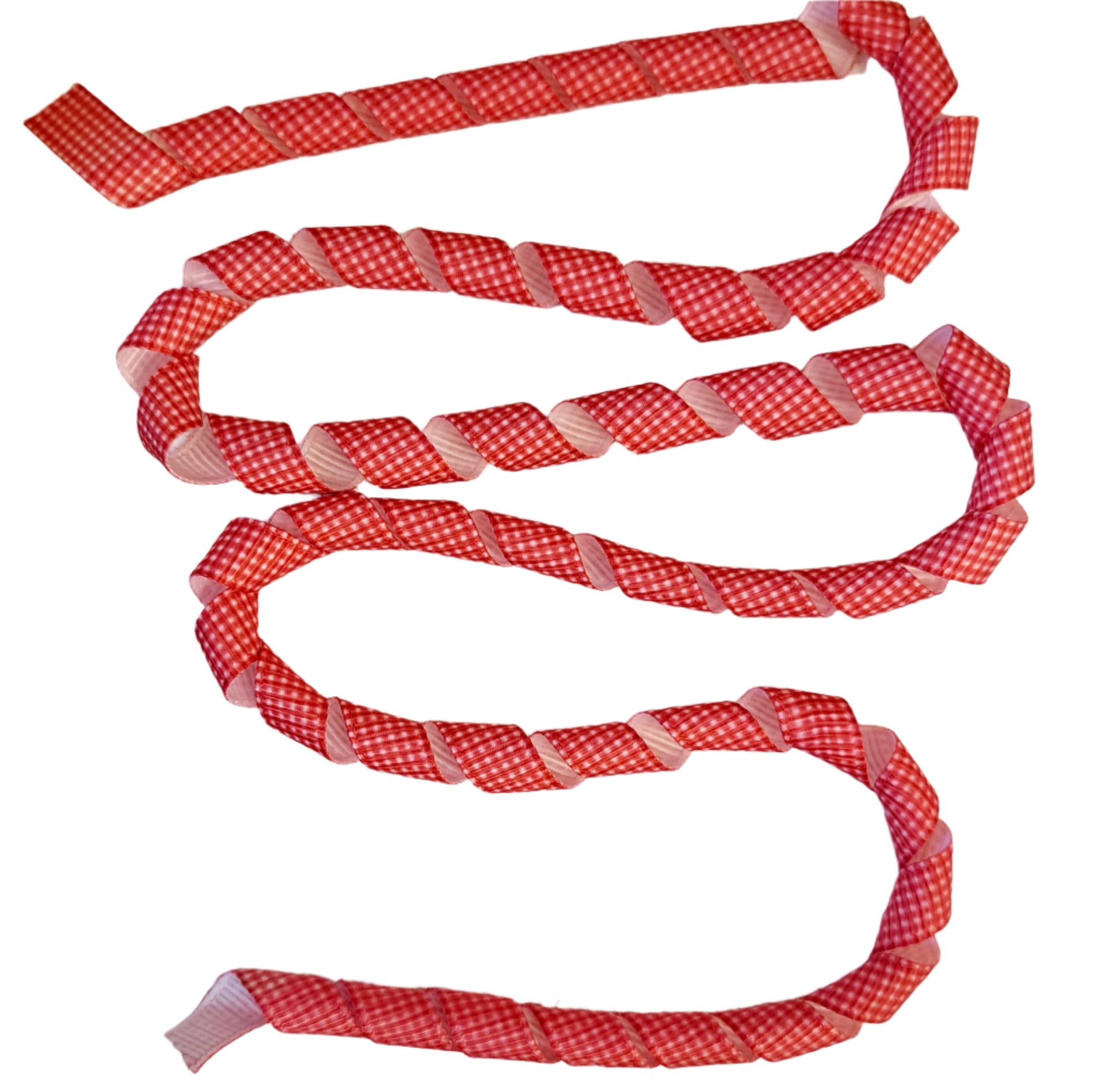 Candy cane-shaped cookies with red and white ribbons on a textured white background