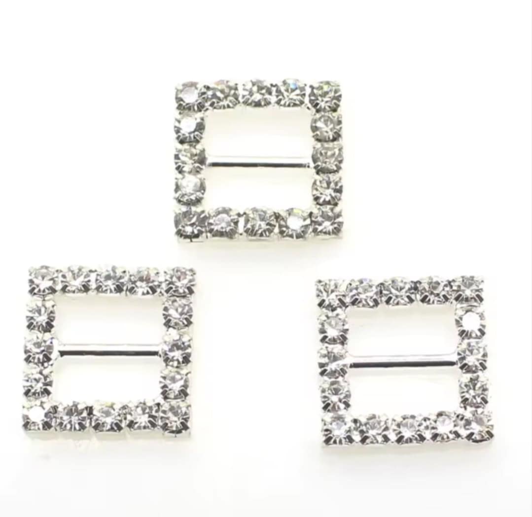 set of three square-shaped hair clips with rhinestone embellishments on a white background