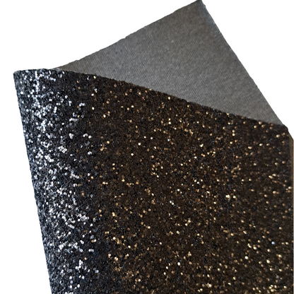 chunky glitter black coloured sheet on a white background