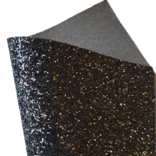 chunky glitter black coloured sheet on a white background