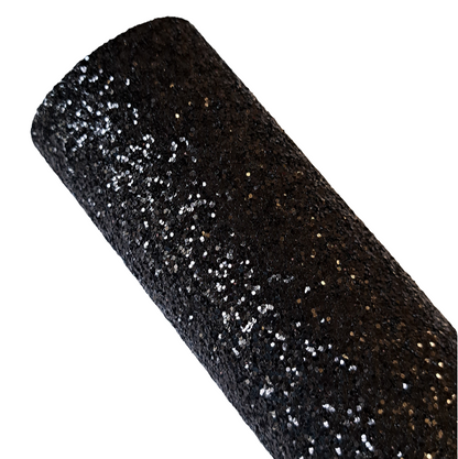 chunky glitter black coloured roll on a white background