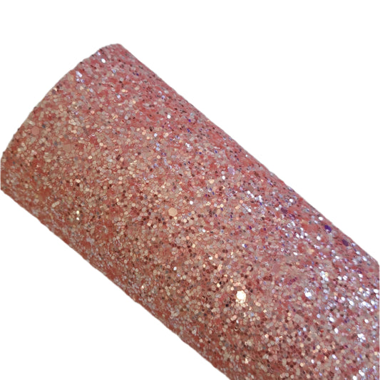 chunky glitter coral coloured roll on a white background
