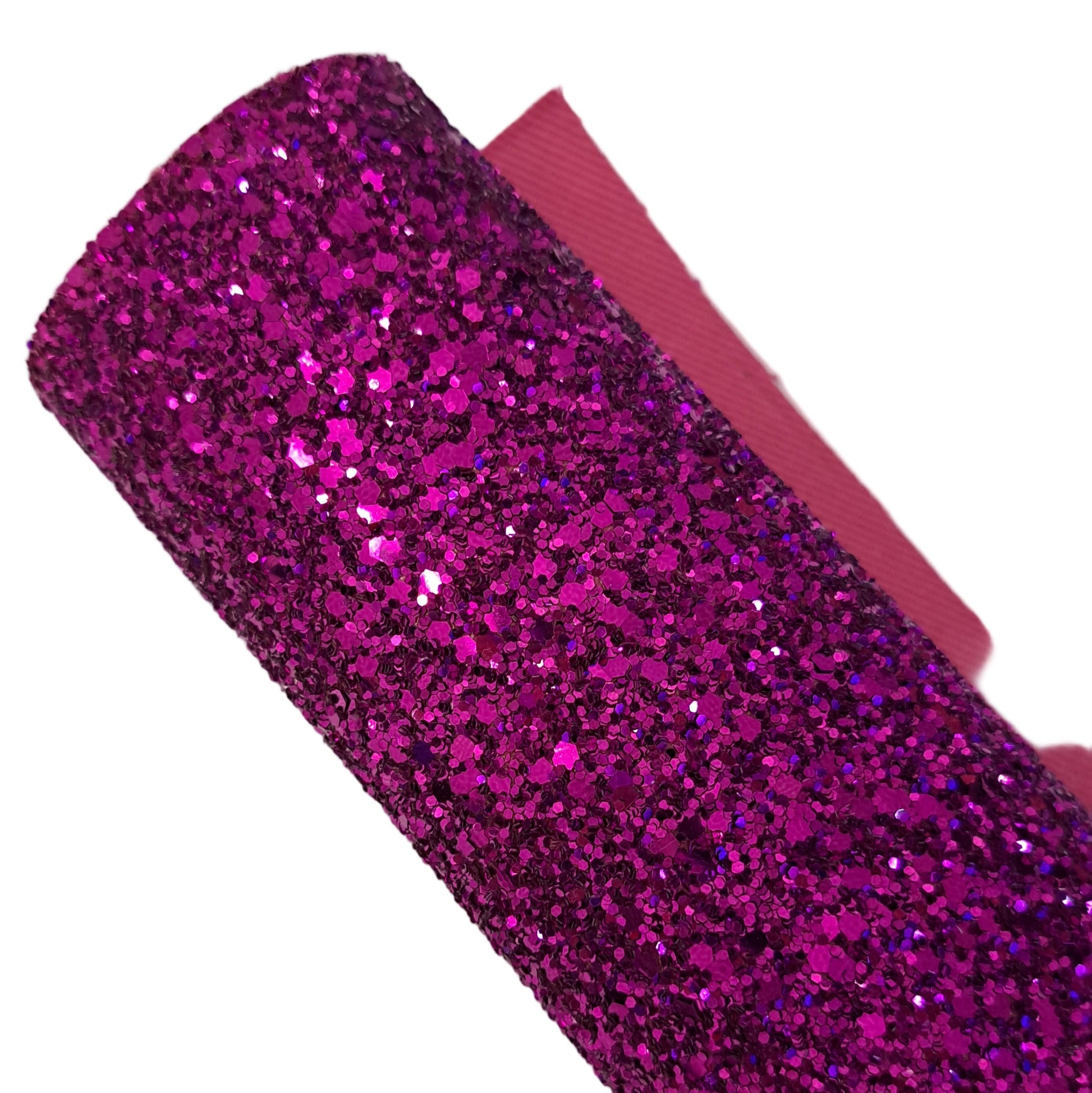 chunky glitter fushia coloured roll on a white background