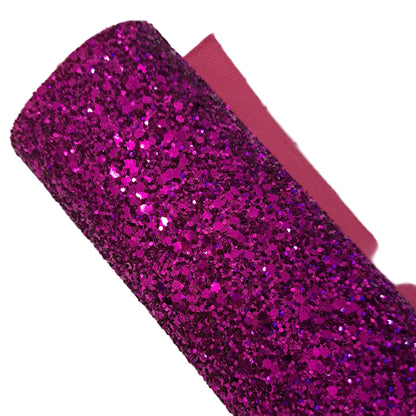 chunky glitter fushia coloured roll on a white background