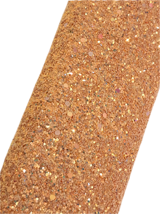 chunky glitter orange coloured roll on a white background