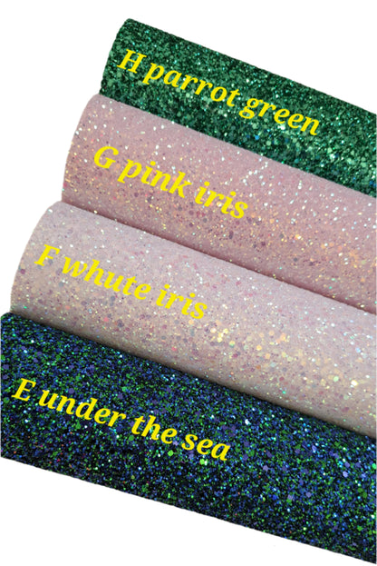 chunky glitter in parrot green, pink iris, white iris and under the sea colours on a white background