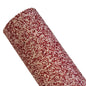 chunky glitter raspberry sprinkles coloured roll on a white background