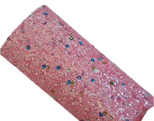 chunky glitter sequins pink coloured roll on a white background