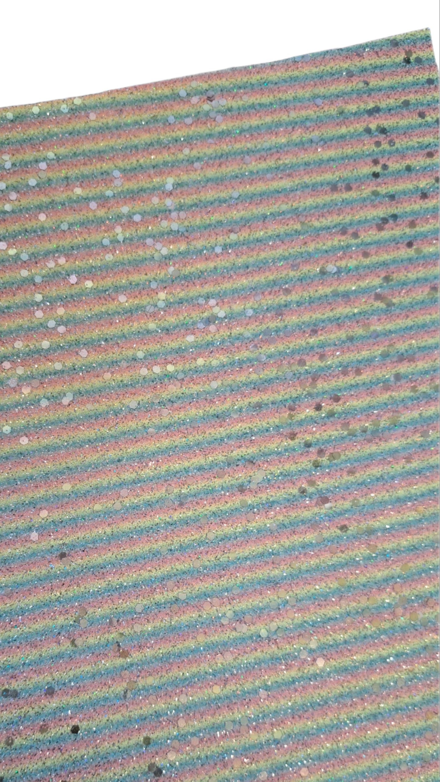 chunky glitter red, blue and yellow stripes coloured roll on a white background