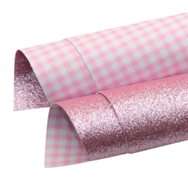 gingham checked and glitter double sided fabric in pink and white colours on a white background