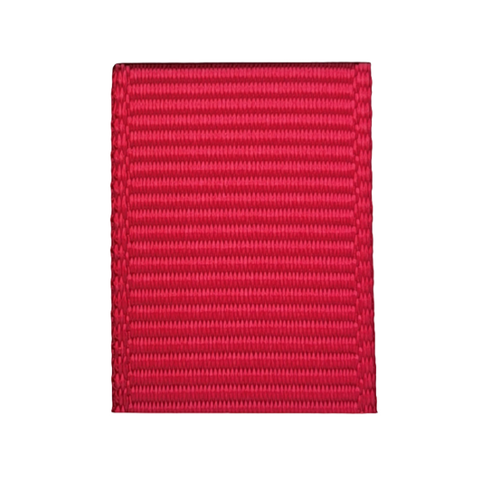 grosgrain ribbon in shocking pink colour on white background