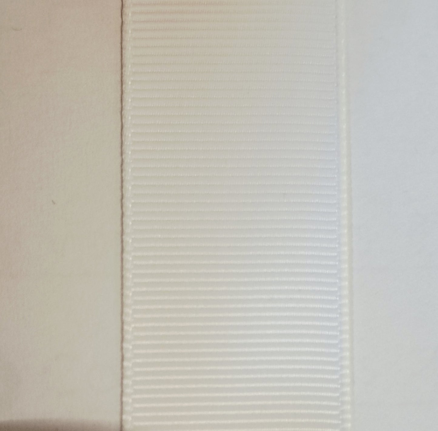 grosgrain ribbon in white colour on white background