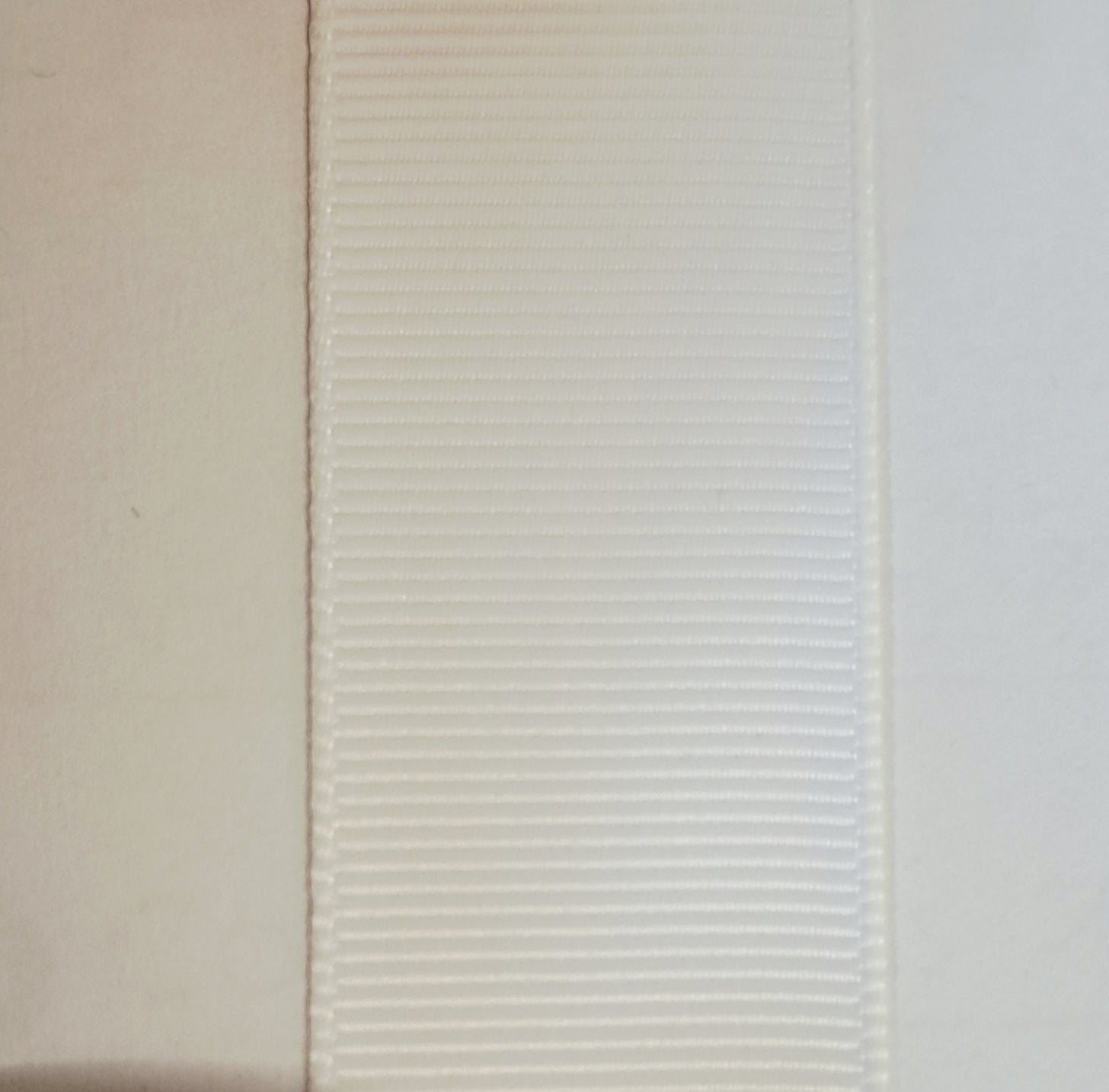 grosgrain ribbon in white colour on white background