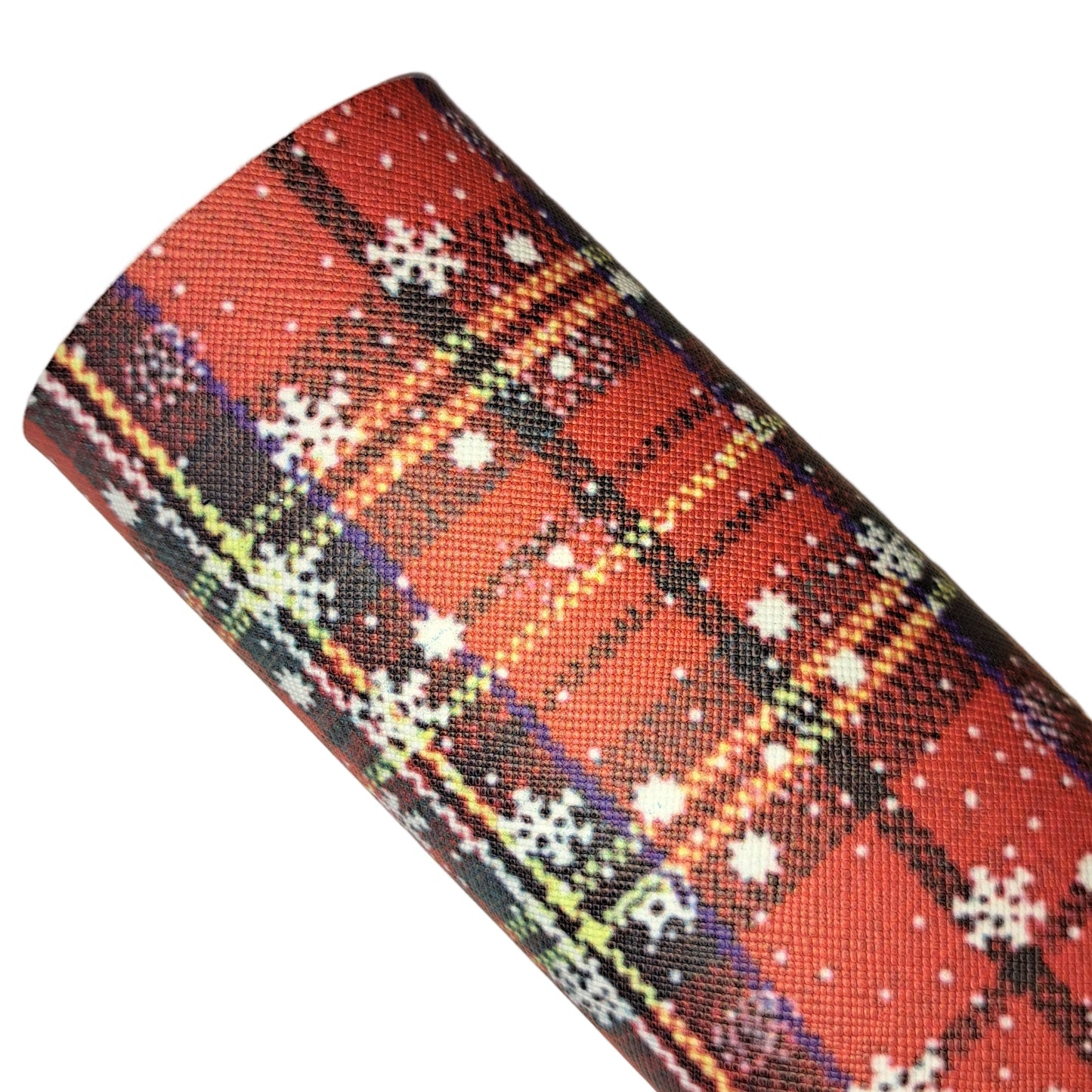 Plaid patterned product with snowflake designs on a white background