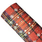 Plaid patterned product with snowflake designs on a white background