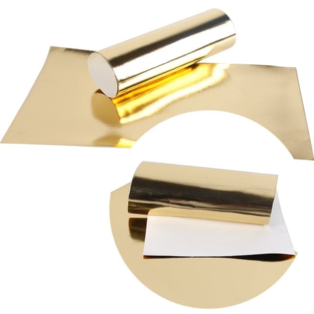 metallic ribbon in gold colour on a white background
