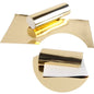 metallic ribbon in gold colour on a white background