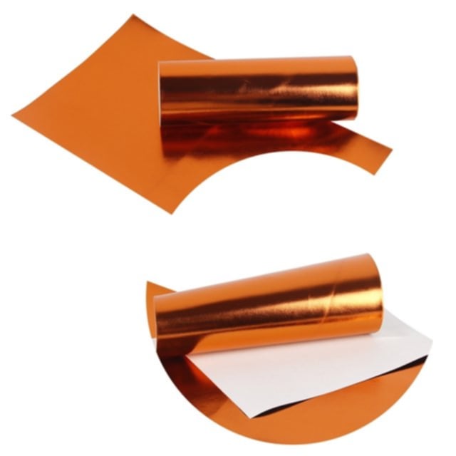metallic ribbon in orange colour on a white background