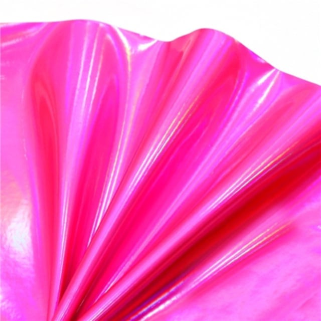 colourful mirrored metallic sheet in pink colour on a white background