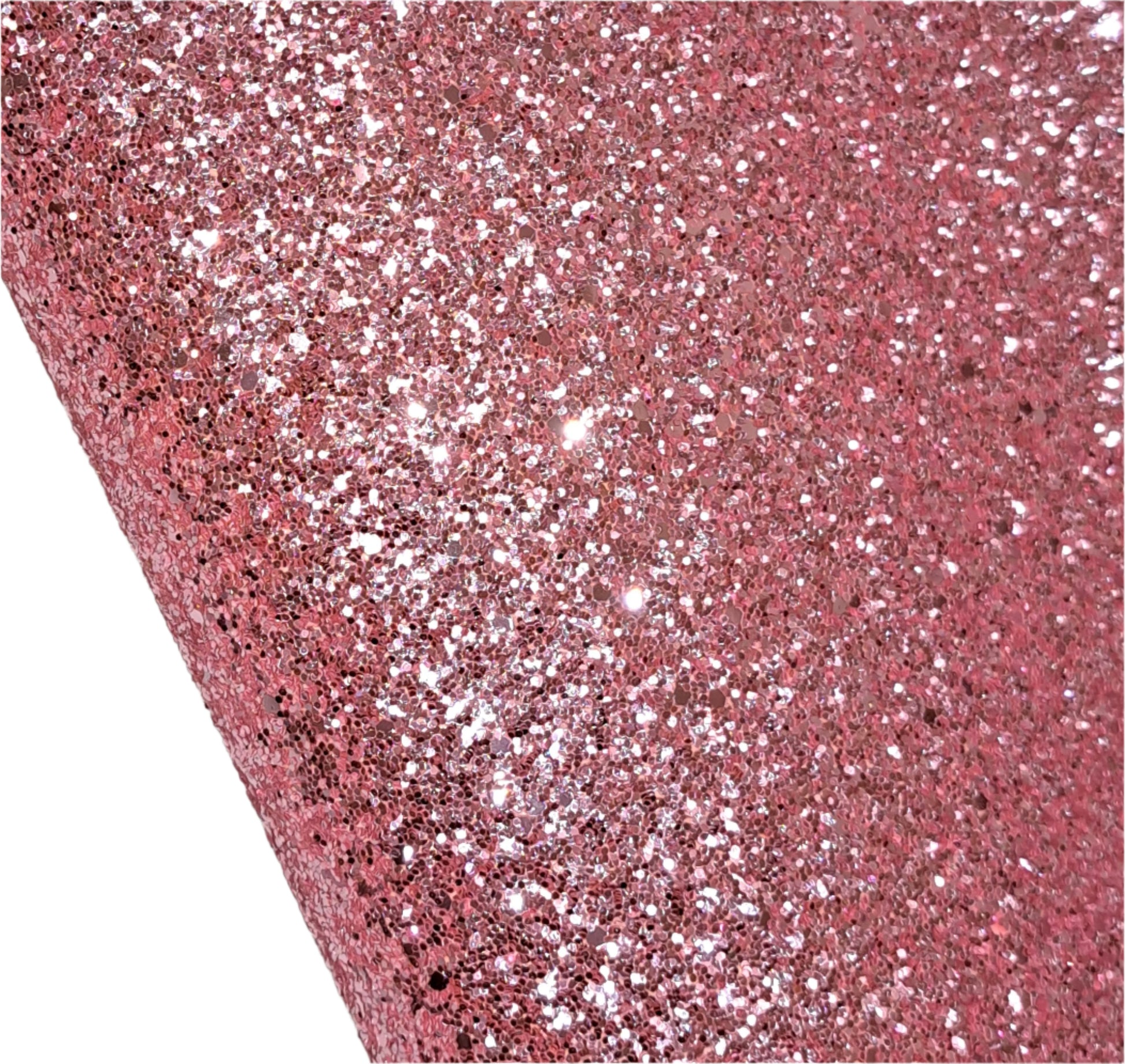 Close-up of pink glittery material on a white background
