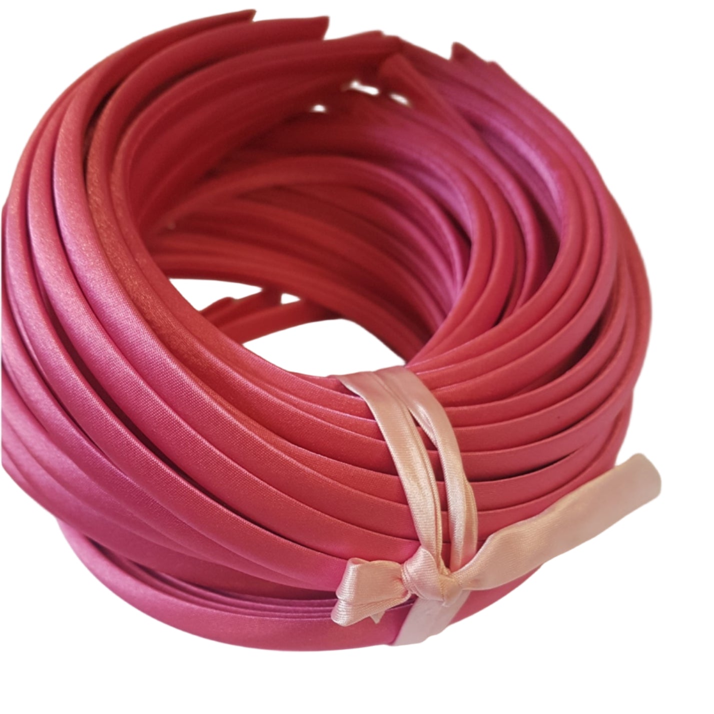 satin headbands in a hot pink colour on a white background
