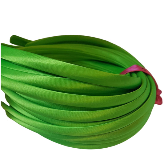 satin headbands in a key lime colour on a white background