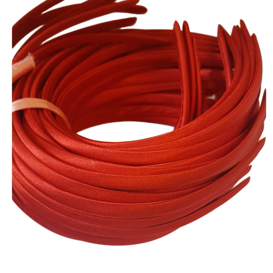 satin headbands in a red colour on a white background