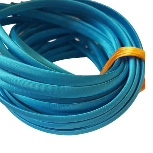 satin headbands in a turquoise colour on a white background