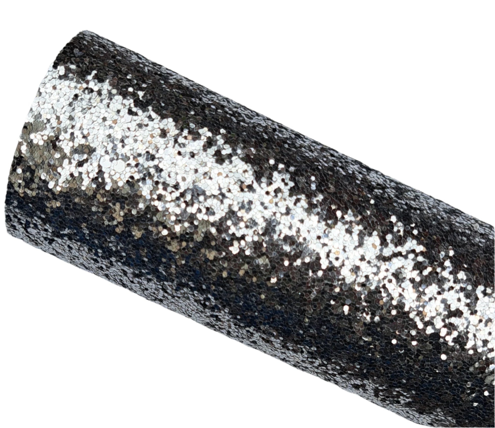 Roll of black glittery fabric on a gray background