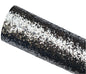 Roll of black glittery fabric on a gray background