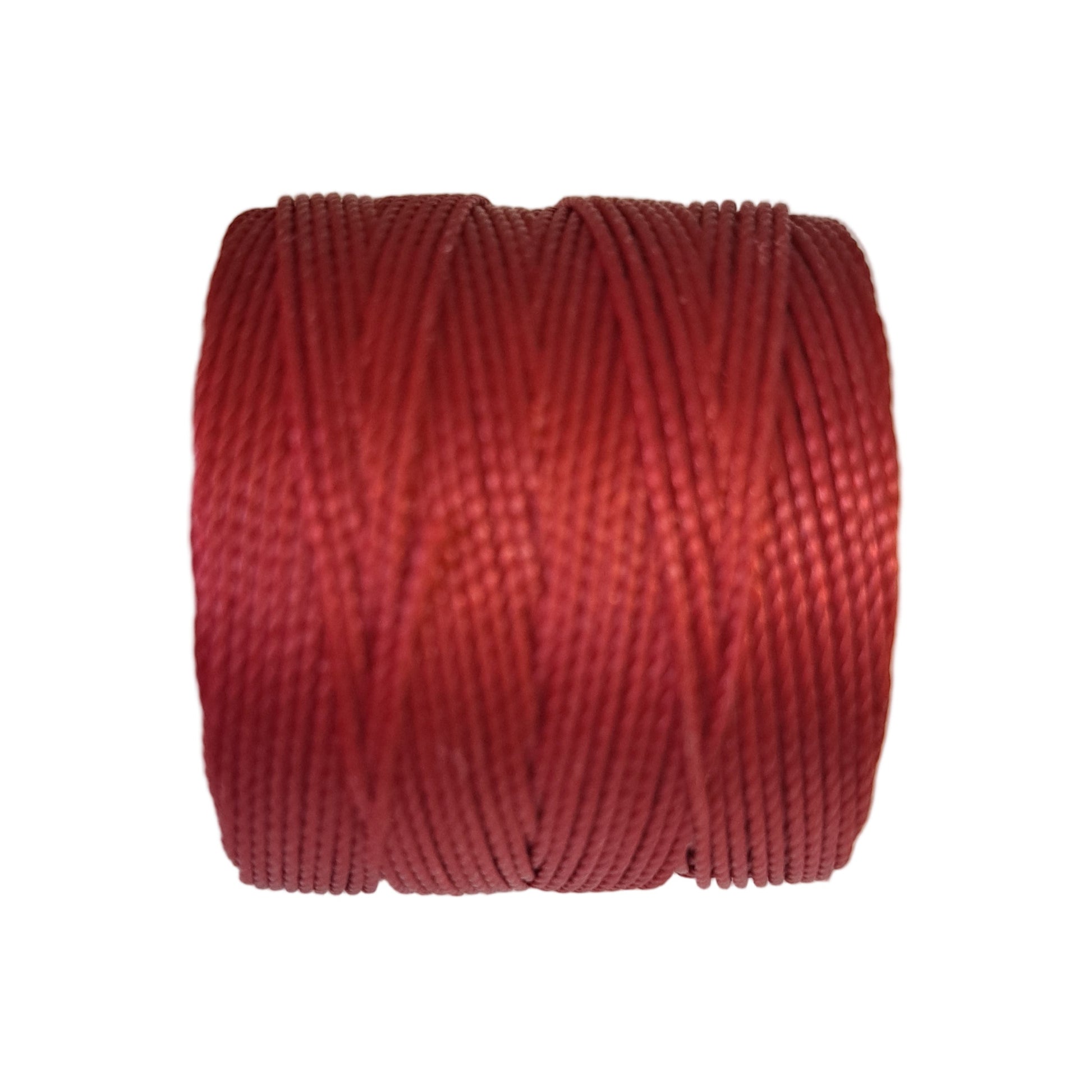 a roll of superlon bead cord in red on a white background
