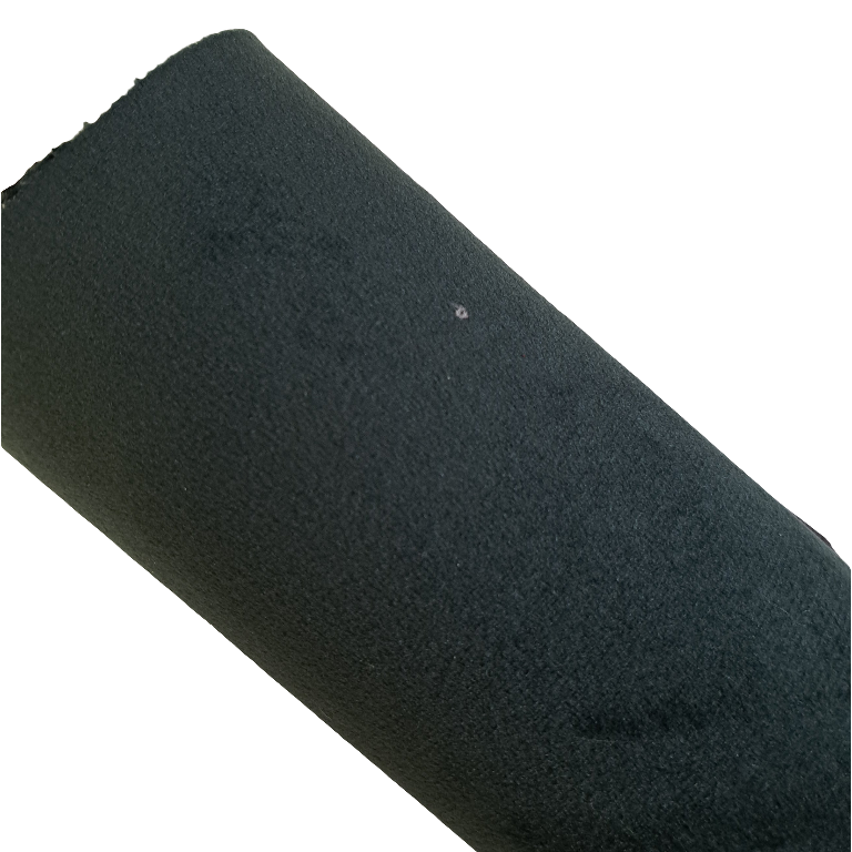 a roll of black coloured velvet fabric roll on a white background