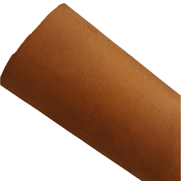 a roll of burnt orange coloured velvet fabric roll on a white background