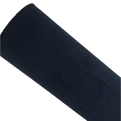 a roll of navy coloured velvet fabric roll on a white background
