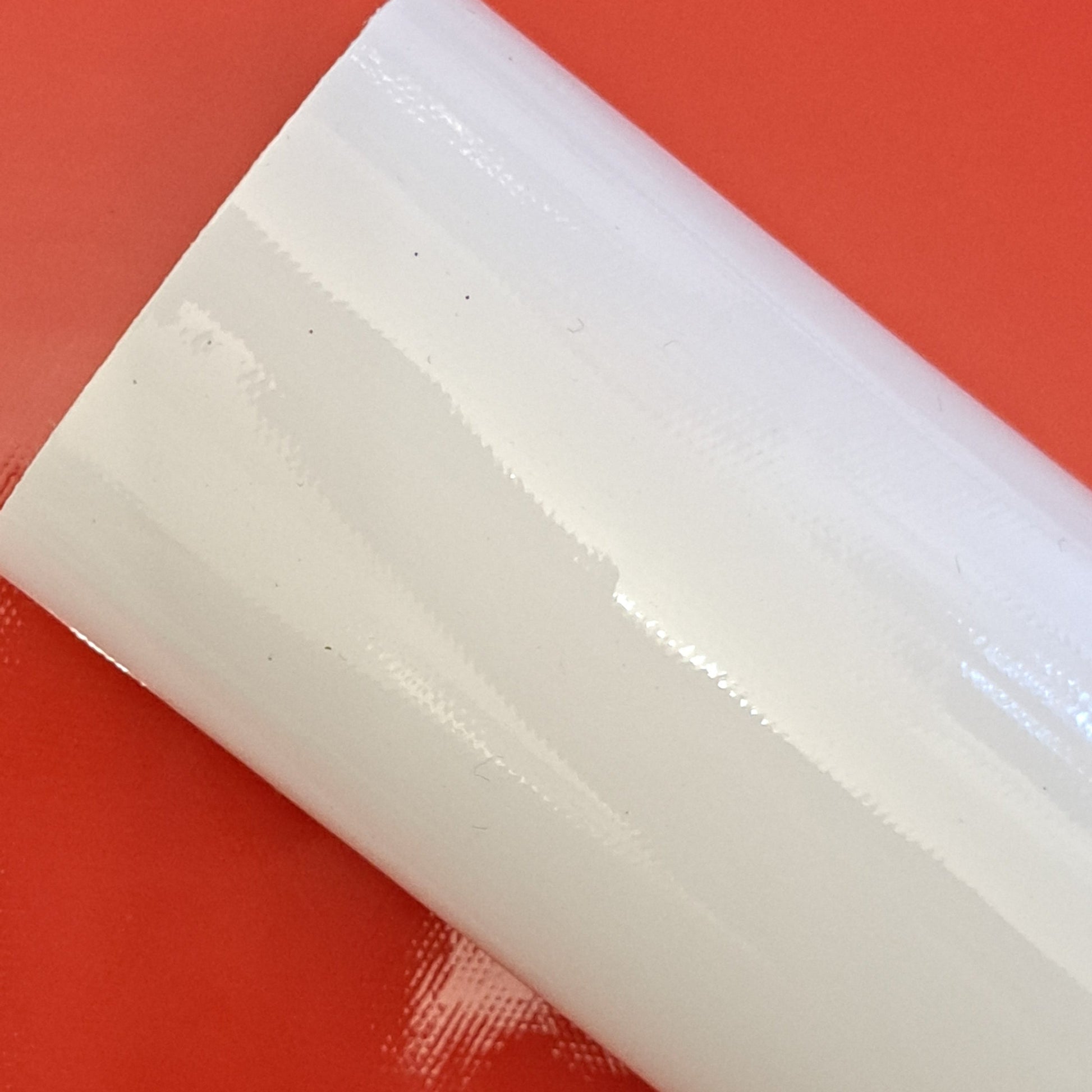 White patent leather smooth glossy finish 